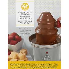 Learn the ins and outs of setting up a chocolate fondue fountain for valentine's day, birthdays, celebrations. Wilton Mini Chocolate Fountain 6 3 4in X 11in Party City