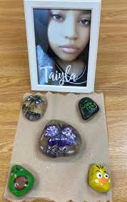 Rocks painted by Tay, first and last