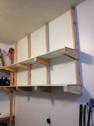These storage shelves can be built from scrap 2 x 4s and plywood, and are as strong as anything you'd buy from the store, but cost a lot less money. Diy Garage Shelves For Your Inspiration Just Craft Diy Projects