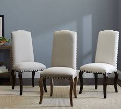 When it comes to dining room furniture, every stylistic feature warrants meticulous attention to detail. Calais Upholstered Dining Chair Pottery Barn