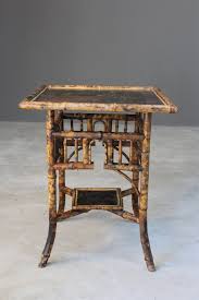 Made of natural bamboo, the whole side table is sturdy with no peculiar smell. Antique Oriental Style Bamboo Side Table Kernow Furniture