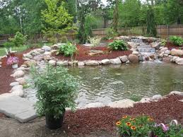 Large Backyard Pond With Beautiful Waterfalls Built By Artistic Design Garden Ponds Ponds Backyard Large Backyard Garden Design