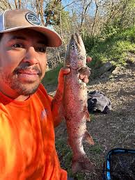 Thought you'd guys and gals would get a kick out of the steelhead my wife  designed and tattooed recently.