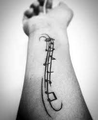 Discover vibrating strings and sophisticated black and white keys with the top 60 best piano tattoos for men. 50 Music Staff Tattoo Designs For Men Musical Pitch Ink Ideas