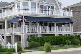 Navy Blue Sunbrella Fabric Porch Awnings Fabricated And Installed By Kreiders Canvas Of Lancaster County Pa Residential Awnings Porch Awning Awning Shade