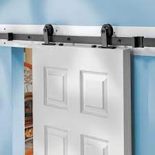 The rolling barn door design implements smooth rolling wheels that are installed and glides on the metal rolling door hardware kit offers many accessories to compliment your door and hardware. I Semble Rolling Door Hardware Kit Top Mount Black Rockler Woodworking And Hardware