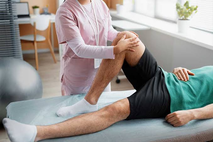 Physiotherapy rehabilitation session with patient