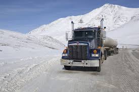 An ice road (ice crossing, ice bridge) is a winter road, or part thereof, that runs on a naturally frozen water surface (a river, a lake or an expanse of sea ice) in cold regions. Ice Road Trucker Pay How Much Do Ice Road Truckers Make