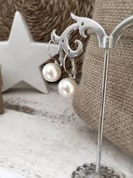 Toutes les perles sont filées au chalumeau dans mon atelier, et la plupart des boucles d'oreilles sont des boucles d'oreilles pendantes , etant donné qu'il y a une perle de verre sur tous les modèles. Boucle D Oreille Pendante Argentee Avec Perle Ronde