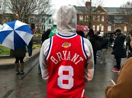 Kobe Bryant fans gather in DC for emotional candlelight vigil