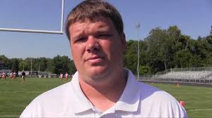 Rochester football: Coach Derek Leonard