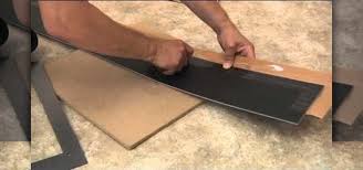 Trafficmaster laminate flooring is incredibly easy to install and does not require screws, nails, or glue. How To Install Your Own Floating Vinyl Plank Flooring In Your Home Interior Design Wonderhowto