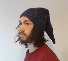 Decrease (divide the stitches between 3 double pointed needles and knit with the 4th): Knitting A Pointy Hat Assorted Things That I Have Made
