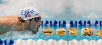 That's how many calories an average person eats in an entire week, but michael phelps eats it all in one day. Olympic Star Michael Phelps Giant Breakfast Team Breakfast