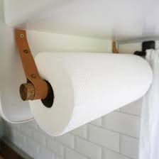 If you're picky about your toilet paper and need a special luxury brand to keep comfy you may not be cut out for rv life. One Of My Favorite Diy Projects In The Rv Is This Little Paper Towel Holder I Used Leather Strips A Dowel Som Paper Towel Holder Camper Storage Towel Holder