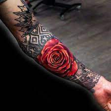 Completed in a black color, this design contrasts well with the skin. 60 Red And Black Tattoos For Men Manly Design Ideas