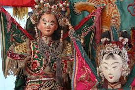 Artists from the malaysia teochew puppet and opera house perform at the masjid jamek station in kuala lumpur, malaysia, on april 19, 2018. Mypenang