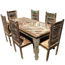 Custom live edge walnut and salvaged hardwood dining tables. Tucson Rainbow Reclaimed Wood Dining Table Shutter Back Chair Set