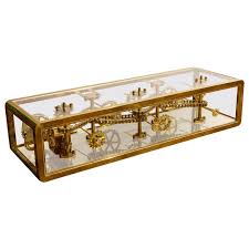 4.7 out of 5 stars. Brass And Lucite Display Coffee Table With Moving Gears For Sale At 1stdibs