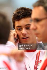 Reuben Ross and Alexandre Despatie of Canada pose with the gold... News  Photo