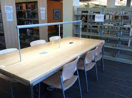 Study Table With Integrated Lighting And Electrical Outlets Holyoke Mass Pl Library Table Library Furniture Library Design