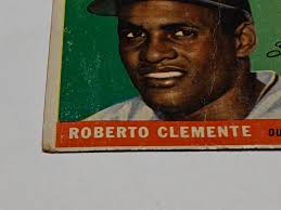 Which company would give a grade to a vintage sports card with multiple  flaws?