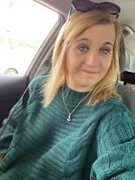 Striped outfit with rain boots and faux fur vest