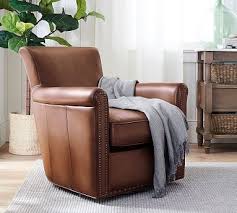 This collection is great for any space and will be your favorite place to relax and unwind. Irving Roll Arm Leather Recliner With Nailheads In 2021 Swivel Armchair Leather Furniture Living Room Chairs