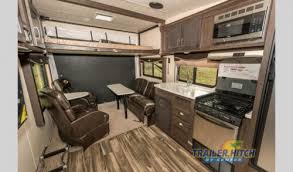 Five of them were purchased, plus a sixth which was ordered in pieces and assembled in a way that allowed hydraulic rams to raise and lower it out of the lake. Forest River Stealth Toy Hauler Review 3 Luxury Features