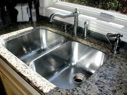 That is a porcelain kitchen sink that's been undermounted to a laminate counter. Greatest White Undermount Kitchen Sink Designs Homes By Ottoman Homes By Ottoman