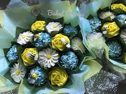 Bouquet Of Daisies Blue Hydrangeas And Yellow Roses With Handcrafted Bees Www Bakedblooms Com Cupcake Bouquet Floral Cake Custom Cupcakes