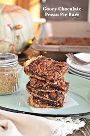 Remove the pie from the oven (the pie will finish setting up as it sits) and cool completely before slicing. Chocolate Pecan Pie Bars Tidymom