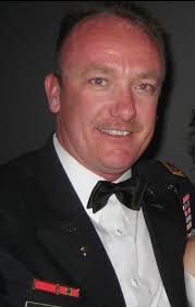 Mrs. Anderson for me...always kept her tissues in her sleeve, I do the same  because of her.