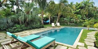 Key West Pool Tropical Garden Landscaping Network Poolside plants should be strong plants that can withstand a pool's climate and will still look great.