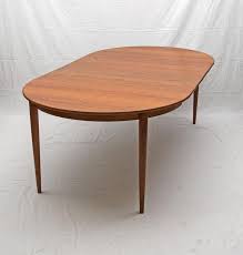 Alder solids and mahogany veneers. Round Danish Teak Dining Table Two Leaves Moreddi At 1stdibs