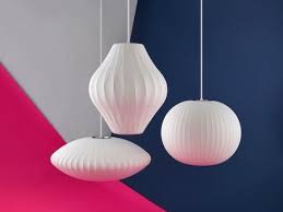 This pendant light accommodates three 75w bulbs, which are not included. Nelson Bubble Accent Lighting Herman Miller