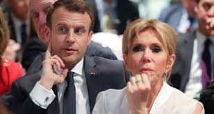 Macron kisses his wife at a meeting for women's day in paris. Emmanuel Macron Refuses To Recognise Jerusalem As Capital Of Israel
