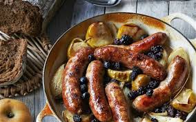 Baked Sausages With Apples Onion Raisins And Cider Cider Recipe Homemade Sausage Recipes Sausage Bake