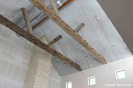 The housing is the actual light fixture. A Corrugated Metal Ceiling Domestic Imperfection