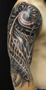 48 Biomechanical Tattoo For Geeks Biomechanical Tattoo Biomechanical Tattoo Design Sleeve Tattoos