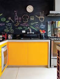 The weathered gray wood frame and faux boxwood wreath give this chalkboard a farmhouse look. 49 Creative Chalkboard Ideas For Kitchen Decor Digsdigs