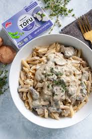 Tofu has a mild flavor, meaning it's perfect for soaking up marinades and sauces. Creamy Tofu Garlic Mushroom Pasta Recipe Well Vegan