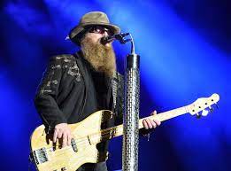 With the band, hill plays bass guitar, sings backing and lead vocals, and keyboards. Gl04wnqgovtuum