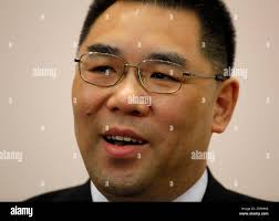 Macau Chief Executive-elect Fernando Chui, a former culture minister and  the only candidate, smiles during a press conference after he was approved  by a 300-member panel