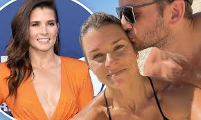 Danica patrick's estimated net worth is between $18.0 and $60.0 million, and she earned it all through her adventurousness. Danica Patrick Unveils New Boyfriend Carter Comstock With Romantic Kissing Snap On Instagram Daily Mail Online