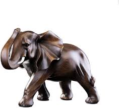 Elephant has the meanings of power, strength. Amazon Com Feng Shui Elephant Statue Rosewood Color Wealth Lucky Figurine Office Home Decor Sculpture Gift Home Kitchen