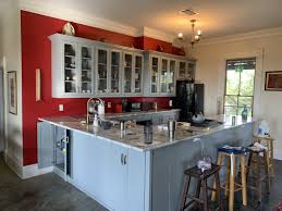 red kitchen with gray painted cabinets