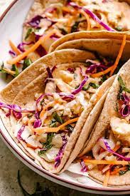 Preheat a grill to high heat and lightly spray with olive oil. Easy Fish Tacos With The Best Taco Sauce Homemade Slaw