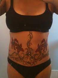 Pin On Tattoos Covering Up Tummy Stretch Marks