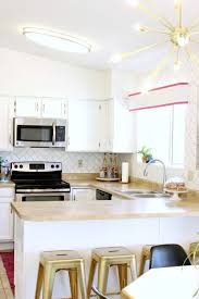 Mallory S White Kitchen Makeover Reveal Classy Clutter White Kitchen Makeover Kitchen Diy Makeover Kitchen Cabinets Before And After